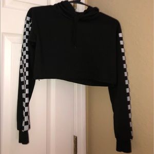 Black cropped hoodie with checkerboard sleeves